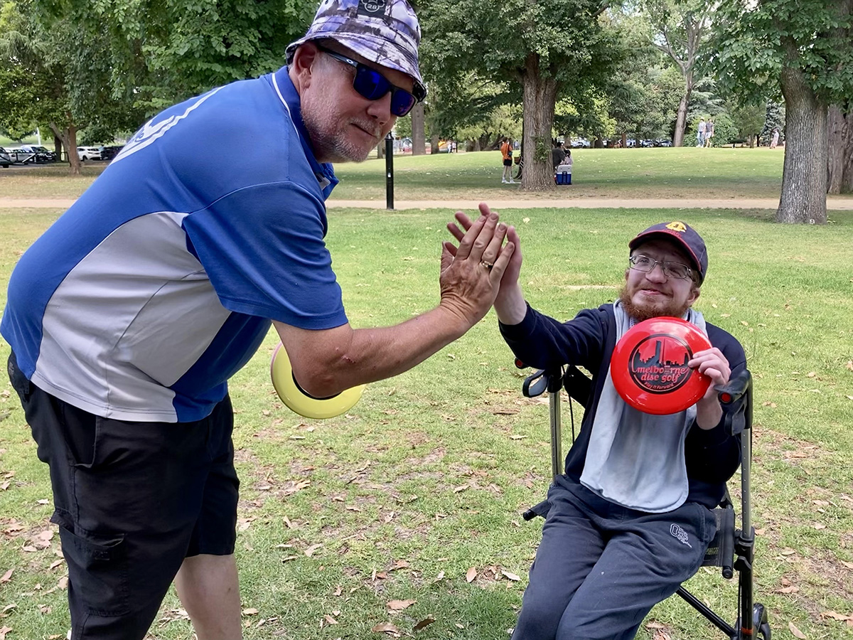 Club President Jeff Brunsting with one of the participants at the Maccabi Come and Try day at Caufield Park